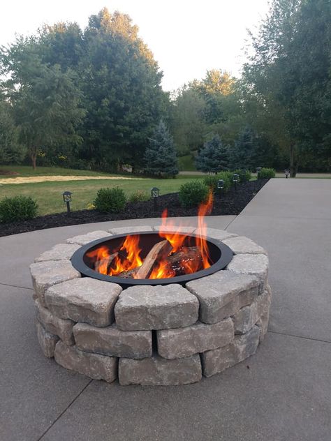 stone-fire-pit Front Patio Fire Pit, Concrete Pad Fire Pit Area, Fire Pit On Concrete Patio, Concrete Fire Pit Area, Concrete Patio With Fire Pit, Stamped Patio, Patio With Fire Pit, Hillside Landscape, Cozy Fire Pit