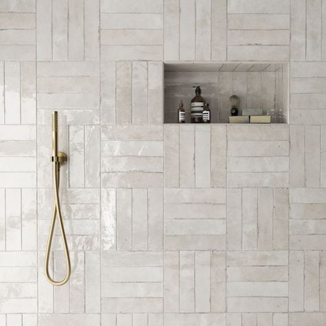 Taupe Vanity Bathroom Ideas, Tiled Bathroom Vanity, Ivory Bathroom Ideas, Beige Shower Tile Ideas, Bathroom Ideas Beige Tile, Chevron Tile Bathroom, Taupe Bathroom Tile, Beige Shower Tile, Modern Bathroom Design Lighting