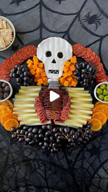 Ain’t Too Proud To Meg on Instagram: "SAVE this post & follow @ainttooproudtomeg for more. Comment CHEESE & I’ll DM you the full instructions to this CHARCUTERIE SKELETON so you can have it ready for #halloween.     INGREDIENTS  * 13 oz brie  * 2 oz blueberry jam  * 4 yogurt covered pretzels  * string cheese * 16 oz young manchego, sliced evenly lengthwise & height wise into triangles * 12 oz @columbusmeats Italian Dry Salame  * @columbusmeats Charcuterie Tasting Board (I used the Calabrese Salame, Castelvetrano olives & chocolate covered cranberries from here) * 10 oz mild cheddar, cubed  * 30 oz dark purple grapes  * 8 dried orange slices     INSTRUCTIONS  1. Place brie in the freezer for 15-20 minutes to allow for easier cutting.  2. For the brie skull, cut wedges out of the sides of th Skeleton Brie Cheese, Skull Brie Cheese, Charcuterie Skeleton, Tasting Board, Castelvetrano Olives, Halloween Finger Foods, Yogurt Covered Pretzels, Charcuterie Board Meats, Halloween Snacks For Kids