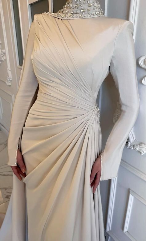 #EveningDress #PartyDress #FormalDress #LongSleeveDress #ElegantDress #Chic #Glam #Fashion #Style #FashionTrends #LongSleeveEveningDress #LongSleeveGown #ElegantDress #EveningGown #SleeveDress #FashionDress #GlamourDress #VNeckline Dress #PleatedSkirt Simple White Dress Hijab, Hijab Evening Dress Classy, Graduation Jumpsuit Outfit, Hijab Engagement Dress, Soiree Dresses For Hijab, Simple Engagement Dress, Hijabi Dresses, Summer Fashion Dresses Casual, Elegant Silk Dresses