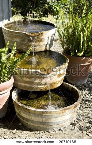 Old wooden barrel style water fountain Desert Yard, Marian Garden, Barrel Fountain, Garden Tricks, Wooden Barrels, Fountain Ideas, Concrete Fountains, Taman Air, Garden Water Feature