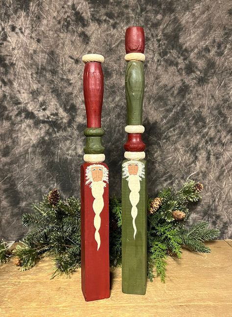 Primitive wooden spindle Santa Claus! Set of 2 hand painted Santas on antique wooden spindles! One of a kind Christmas decor! Perfect for mantles!  Size: 15 x 1.5 in; 17 x 1.5 in Spindle Snowmen, Painted Santas, Santa Christmas Decor, Primitive Christmas Crafts, Santa Claus Crafts, Spindle Crafts, Stair Spindles, Santa Paintings, Diy Crafts Love