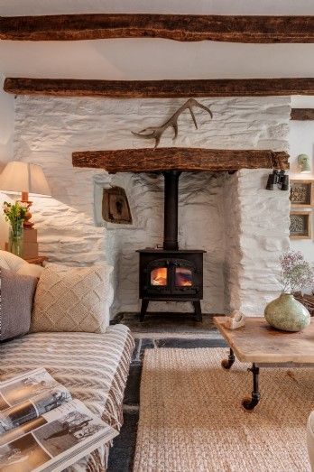 October Cottage in Cornwall UK – A Cottage Dream Stove Alcove, Rustic Cottage Interiors, Cottage Romance, Stove Surround, Dreamy Interiors, Shabby Chic Furniture Diy, Roan Mountain, Cottage Fireplace, Wood Burners