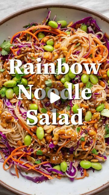 Nisha Vora | Vegan Recipes on Instagram: "This cold noodle salad with rainbow veggies is seriously delicious and a new fave in my house.  Featuring a limey sesame noodle sauce, crispy fried tempeh nuggets and edamame for #plantprotein, crunchy cabbage and carrots, and a rich, nutty, and deeply savory peanut-tamarind sauce, it’s got so many amazing flavors and textures.   Comment “RAINBOW” and I’ll send you the recipe!   PS: If you listened to the voiceover, THANK YOU for being here and for helping me to find my dream career 🥹  https://rainbowplantlife.com/noodle-salad-with-rainbow-veggies/  #vegancooking #noodles #noodles🍜 #noodlesalad #vegandinner #veganprotein" Tempeh Nuggets, Fried Tempeh, Cold Noodle Salad, Noodle Sauce, Sesame Noodle, Rainbow Veggies, Cabbage And Carrots, Noodle Salad Cold, Rice Noodle Salad