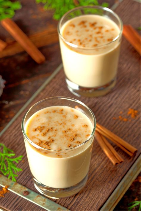 Eggnog has been around for a very long time, in both its alcohol and non-alcoholic forms. Featuring brandy, rum, lots of egg, and spices, this recipe is sure to warm you up and fill you up during the holiday season. Eggnog Alcoholic Drinks, Non Alcoholic Eggnog Recipe, Eggnog Recipe Spiked, Eggnog Cocktail Recipe, Egg Nog Recipe Easy, Alcoholic Eggnog, Eggnog Drinks, Eggnog Cocktail, Eggnog Recipe Homemade