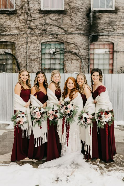 Journeyman Distillery Wedding | Erin & Mark - Stellaluna Events Rustic Christmas Wedding Bridesmaids Dresses, Christmas Wedding Inspiration Dresses, Red Winter Bridesmaid Dresses, Bridesmaid Winter Dresses, Maroon Winter Wedding, Christmas Eve Wedding Ideas, Christmas Theme Wedding Ideas, Winter Wedding Ideas February, Christmas Wedding Bridal Party