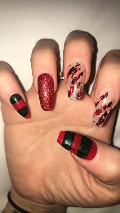 Halloween ready! Nightmare on Elm Street bc a Nightmare Before Christmas gets played out 🙄💚❤️🖤🔥🔥🔥 #freddykrueger #freddy #halloweennailart #halloweennails #nailart #nailartdesigns #horrorart #nailinspiration #nightmareonelmstreet #foil #rednails #holidaynails #naildesigns #nailsofinstagram Halloween Horror Nail Designs, Elm Street Nails, Freddy Nails Halloween, Freddy Krueger Nails Short, Halloween Nails Freddy Kruger, Freddy Krueger Nails Acrylic, Halloween Nails Freddy And Jason, Nightmare On Elm Street Nails, Michael Myers Nails