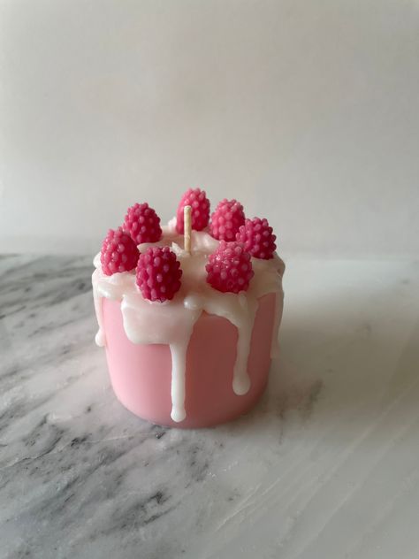 Cute mini raspberry cake candle that's made from pure soy and coconut wax. This candle smells like a berry cake, good enough to eat(please don't) and is raspberry and vanilla scented. This candle is so cute and can be used as decor or is great for a small birthday gift or Mother's Day present. This is a high-quality candle. Soy and coconut wax is also a favorite of environmentally conscious consumers. They even burn slower and more refreshing (helping to better distribute fragrance); moreover, they are non-toxic and less likely to trigger allergies. candle is about 4.5oz in weight The candle is paraffin free, please be careful ordering if you live in a hot area and please bring indoors immediately when the candle arrives. Candle appearance will vary slightly as this is a handmade product. Candle Cake Ideas, Cake Candles Diy, Desert Candles, Candle Dessert, Candle Photography Ideas, Lux Candles, Dessert Candle, Cute Candle, Small Birthday Gifts