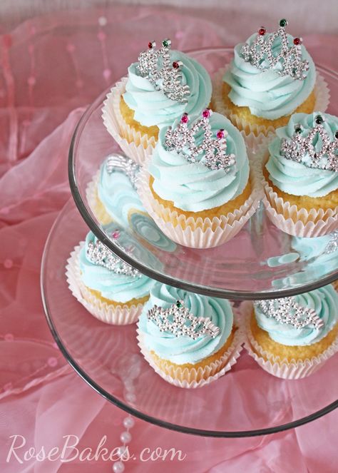 Princess Cupcakes with Tiaras on Stand Princess Baby Shower Ideas, Lavender Frosting, Princess Diaper Cakes, Slab Cake, Baby Shower Princess Theme, Princess Cupcake, Cake Pulls, Snowman Cupcakes, Princess Parties