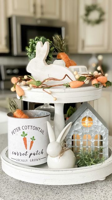 Jenn • Farmhouse Decor | DIY on Instagram: "Let’s style a tiered tray for Easter! 🥕🥕🥕 I love this carrot themed tiered tray don’t you? The inspo for this tiered tray with this cute carrot garland from Michaels. I added that to the top tray and then some cute coordinating decor. Wooden bunny and Peter Cottontail bucket from @birchlanebyjennifer Tiered tray by @feltcreativehome More details coming up later in stories! 🥕 . . #eastertieredtray #easterdecor #easterdecorating #tieredtray #tiered Galvanized Centerpiece, Diy Tray Decor, Carrot Garland, Farmhouse Decor Diy, Cute Carrot, Red Tray, Coordinates Decor, Wooden Bunny, Tier Trays