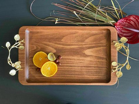 Beech wood Collection with Orchid brass flower design Serving tray with brass handles handcrafted beautifully shipping all over the world Wooden Tray With Metal Handle, Neutral Nurseries, Wood Serving Platter, Wooden Dishes, Kitchen Interior Design Decor, Brass Accents, Wooden Tray, Serving Trays, Nursery Neutral