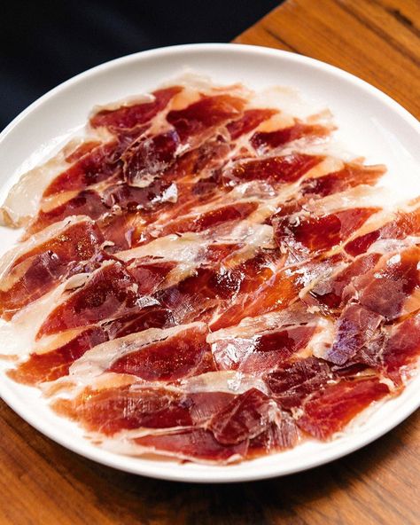 The Infatuation on Instagram: “📍: @florabarnyc 🏆: 8.7 from @infatuation_nyc 🍽: Jamón Ibérico de Bellota 💬: “This incredible plate of luxury ham seems like it would be…” Iberico Ham, Canned Seafood, Serrano Ham, Sliced Ham, Chocolate Nuts, Hams, Aromatic Herbs, Rich In Protein, Dryers