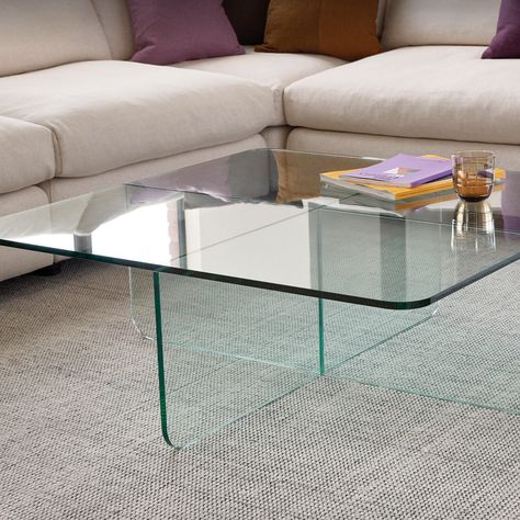 Let the Verre collection introduce transparency, depth, and balance to your space. The choice of clear or grey tempered glass for this coffee table allows you to tailor the translucence of the piece to suit your space and style. Available as either square or rectangle, the Verre coffee table is the perfect piece for those looking for versatility and harmony in their home. Contract Grade SPECSScale: 38″w × 38″d × 13.5″hMaterial: 12mm tempered glassChoose from clear or smoke glass Coffee Table Square, Glass Coffee Table, Family Living, Sitting Room, Glass Table, Store Design, Tempered Glass, Great Rooms, Square