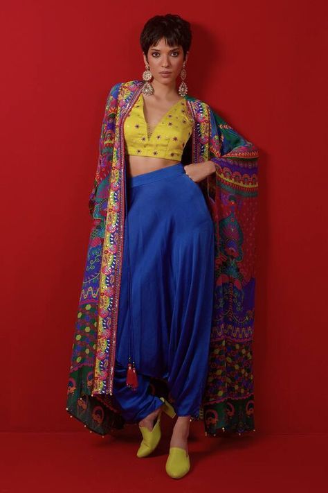 Multicolour floral and geometric print asymmetric cape embellished by ghungroo on hem. Comes with embellished blouse and harem pant. - Aza Fashions Asymmetric Cape, Cape Outfit, Lehenga Saree Design, Desi Wear, Moroccan Fashion, Harem Pant, Desi Fashion Casual, Color Blouse, Multi Color Blouse