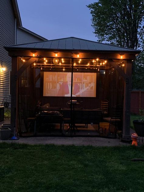 Check Out These 11 Outdoor TV Setups 🌴 📺 ☀️ - Yardistry Structures - Gazebos, Pavilions and Pergolas Gazebo Ideas Backyard With Tv, Outdoor Gazebo With Tv, Outdoor Tv Setup Patio, Gazebo With Tv Outdoor Spaces, Backyard Patio With Tv, Outdoor Tv Projector Ideas, Gazebo Projector Screen, Backyard Gazebo With Tv, Outdoor Tv Area Covered Patios