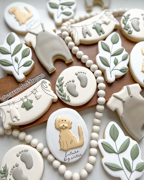 When your dogs are your first babies 😍 I couldn’t resist doing a baby shower theme with a taupe, ivory and sage color palette with a dog cookie thrown in the mix as well. Our Lola turns 10 this year and we always tell the kids she was our first baby! #babyshower #babyshowercookies #babyshowercookieset #dogcookies #goldendoodlecookies #neutralcookies #onesiecookies #onesiecookiefavors #cookiefavors #ctcookies #ctcookieshop #ctcookiecompany #ctcookier #sugarcookies #sugarcookie #sugarcookiedeco... Golden Retriever Baby Shower Theme, Dog Theme Baby Shower Ideas, Dog Themed Baby Shower Ideas, Gender Neutral Baby Shower Cookies, Puppy Baby Shower Theme, Dog Baby Shower Theme, Baby Announcement Cookies, Baby Shower Cookies Neutral, Derby Food