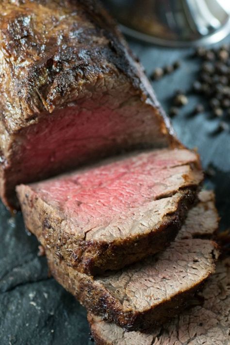 Sliced medium rare beef tenderloin Lawrys Prime Rib Recipe, Holiday Roast Beef, Holiday Roast, Roasted Shallots, Cooking Roast Beef, Sirloin Tip Roast, Grilled Foods, Sliced Roast Beef, Holiday Roasts