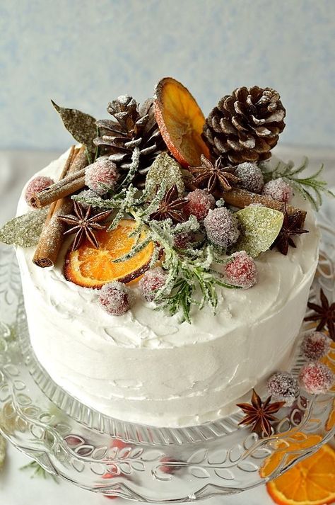 Gingery Christmas fruitcake topped with marzipan, royal icing, sugared cranberries, rosemary and bay leaves, dried orange slices, pine cones and whole spices  - Domestic Gothess Christmas Fruitcake, Fruit Cake Christmas, Christmas Cake Designs, Sugared Cranberries, Torte Cupcake, Christmas Cake Decorations, Xmas Cake, Christmas Cake Recipes, Christmas Fruit