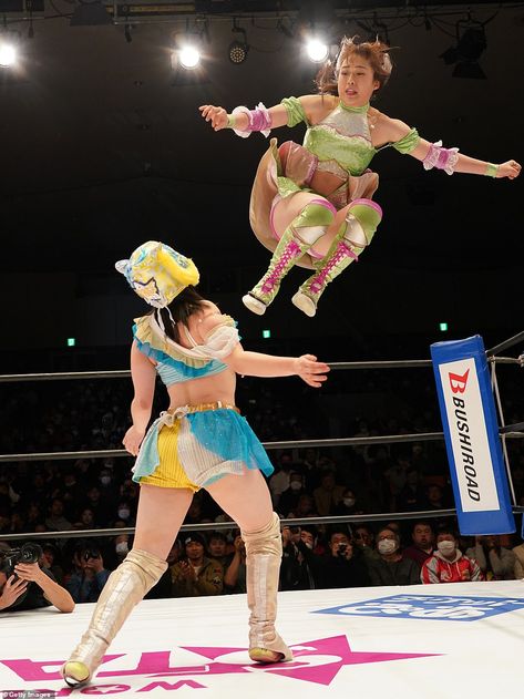 Ask her ref! The girls of all-women Japanese wrestling company show off their moves in Tokyo  | Daily Mail Online Duo Fighter Poses Reference, Mizuki Whirling Candy Wrestling, Japanese Female Wrestling, Flying Kick Pose Reference, Japanese Wrestling Women, Holding Bazooka Pose, Action Poses Female, Wrestling Poses Reference, Wrestler Pose