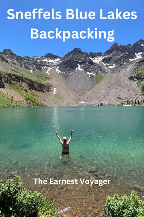 A woman stands in a crystal blue lake, with the caption "Sneffels Blue Lake Backpacking" by "The Earnest Voyager" Backpacking Adventure, Backpacking Trip, River Trail, Alpine Lake, Colorado Travel, Adventure Explore, Blue Lake, Backpacking Travel, Blue Backpack