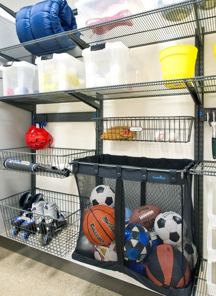 for kids’ items and sports equipment, open shelving is almost always the answer. “I tell parents to forget about lids with kids,” she says. ... Organized Garage, Sports Storage, Garage Organization Tips, Garage Organisation, Garage Update, Shed Organization, Garage Storage Solutions, Garage Organize, Garage Remodel