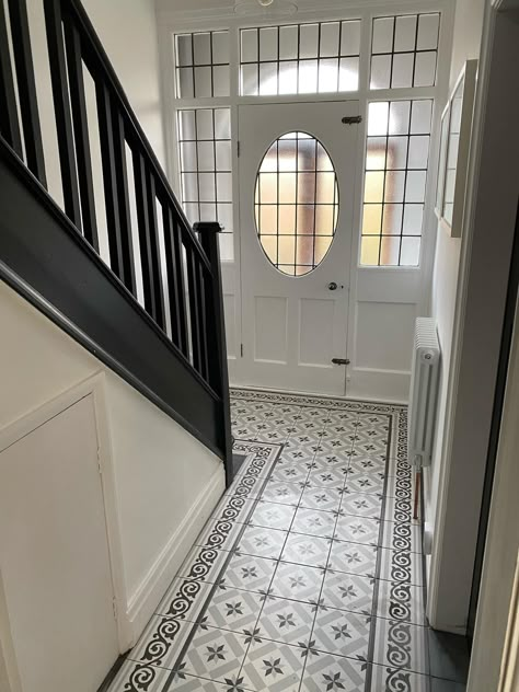 Special order grey patterned victorian style tiles, the perfect tiles to create a period style in this hallway. You can't buy this spanish patterned tile direct from our website as it is a special order item. Get in touch for more info... #hallwaytiles #patternedtiles #victoriantiles #tiles #floortiles #greyfloortiles #patternedgreyfloortiles #patterntiles #victorianfloortiles #periodhome Patterned Tiles Hallway, Pattern Floor Tiles Hallway, 1930s Tiled Hallway, Victorian Mosaic Tiles Hallway, Victorian Hallway Floor Tiles, Edwardian Hallway Tiles, Victorian Tiled Floor, Tiled Hallway Ideas, Tiled Floor Hallway