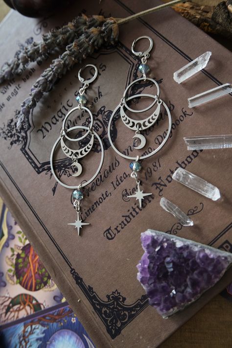 * Stunning statement Moon and Stars earrings which will give your outfit a mystical touch.  * These beautiful dangling earrings have a witchy, bohemian feel to them. * Stainless steel! * The total length of the earrings is approximately 10 cm (aprox 4 inches), hook included.  * They come in a pretty little burlap pouch 🖤 Witchy Necklace, Witchy Boho, Stars Earrings, Silversmith Jewellery, Mystical Jewelry, Moon And Star Earrings, Witch Jewelry, Witchy Jewelry, Magical Jewelry