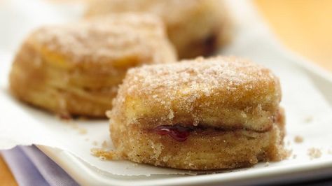 You'll reach star status when you surprise your family with homemade jelly doughnuts!  This easy baked "biscuit to doughnut" version will become a favorite. Pillsbury Biscuits, Jelly Doughnuts, Pillsbury Recipes, Homemade Jelly, Filled Donuts, Breakfast And Brunch, Raspberry Filling, Doughnut Recipe, Donut Recipes