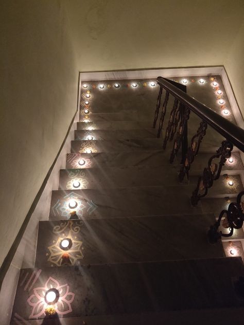 Staircase rangoli, tealight candles, diwali 2018, rice flour coloured art Staircase Rangoli Designs, Diwali Stairs Decoration, Rangoli Designs For Stairs, Rangoli On Stairs, Stairs Rangoli Designs, Memory Techniques, Karthika Deepam, Happy Diwali Images Hd, Diwali Painting