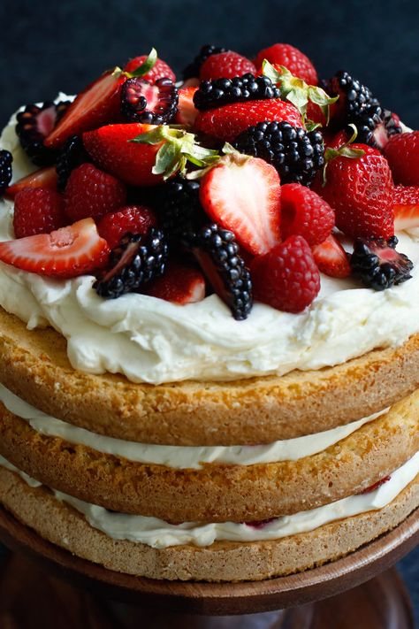 NYT Cooking: Behold! An ode to summer in cake form. In this towering dessert from the food stylist and cookbook author Susan Spungen, crumbly yet tender layers of almond cake are layered with mounds of fresh berries and a rich filling of mascarpone and crème fraîche. It's not difficult to make, but it does take some time, so save this for a lazy Saturday when you've just scored... Berry Layer Cake, Cake Form, Striped Cake, Victoria Sponge Cake, Layer Cake Recipes, Sponge Cake Recipes, Best Chocolate Cake, Almond Cake, Nyt Cooking