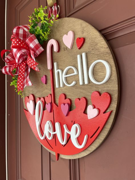 Get into the season of love with this beautiful 3d raised lettering Valentine's Front Door Hanger! We now cut all our signs with birch plywood which is a much harder and better quality than pine. Valentines Day Cut Outs, Valentine Diy Crafts To Sell, Valentine’s Day Outdoor Decor, Valentine Laser Ideas, Valentine’s Day Door Hangers, Valentines Door Hanger Diy, Valentines Signs Wooden, Valentines Day Laser Cut Ideas, Valentine Laser Cut Ideas