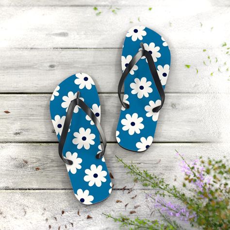 Step into summer with these playful Flip Flops. Adorned with vibrant floral designs, they add a cheerful pop to any outfit. Perfect for beach days, pool parties, or casual strolls, these Flip Flops exude a relaxed vibe that everyone loves. Great for beach lovers, vacationers, or anyone who enjoys fun, stylish footwear. Ideal for warm weather celebrations, picnics, and holiday getaways, they make an excellent gift for birthdays or summer holidays. Embrace comfort and style, and make every step a happy one! Product features - 100% polyester suede provides a soft and durable surface for vivid prints. - Lightweight EVA sole offers flexibility and comfort. - Vibrant colors ensure your footwear stands out. - Slip-resistant textured bottom enhances safety on wet surfaces. - Available in multiple Sandals Vacation, Floral Flip Flops, Printed Flip Flops, Stylish Footwear, Summer Flip Flops, Pool Parties, Summer Holidays, Eva Sole, Beach Lovers