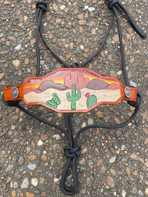 Tooled leather bronc halter Bronc Halter, Bohemian Dreamcatcher, Desert Scene, Western Accessories, Hat Patches, Rock Formations, Tooled Leather, Western Art, Claw Clip