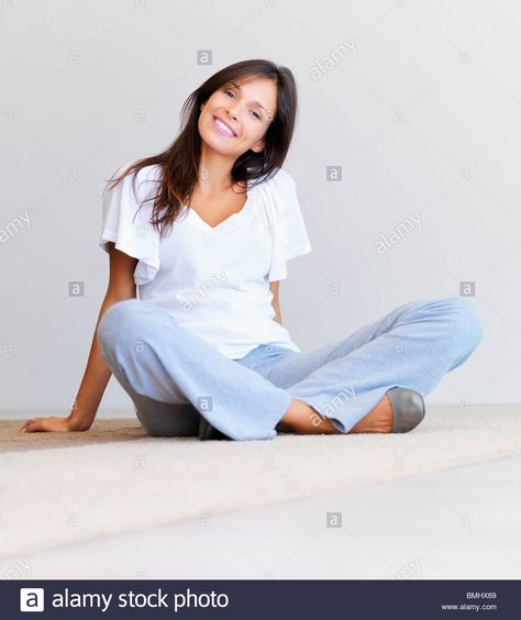 Woman sitting cross legged on floor Stock Photo: 29897233 - Alamy Leg Reference, Pose Sitting, Life Drawing Pose, Sitting Cross Legged, Drawing Legs, Cross Legged, Stock Photos Woman, Sitting Position, Sitting Poses