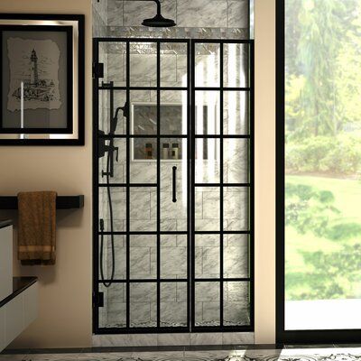 Toulon is a frameless swing shower door designed in step with modern market trends. Toulon has a stylish windowpane look. The glass pattern is made using an application of Jetglaze durable paint, offering a unique style without metal framing for easy maintenance. With clean lines, modern accents, and an upscale look, the indoor Toulon adds timeless style to any bathroom space. Reversible for a right or left door opening; solid brass wall-to-glass self-closing hinges. | Black Grid Shower Door - D Hinged Shower Door, Shower Door Designs, Black Shower Doors, Frameless Hinged Shower Door, Modern Market, Framed Shower Door, Frameless Door, Glass Shower Door, Frameless Shower Door