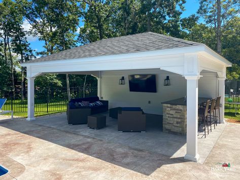 With a privacy wall on your new Ridgefield Pavilion, you can mount a TV for a cool place to enjoy an outdoor movie after swimming in the pool. Pictured: 16' x 24' Ridgefield Pavilion with 24' shiplap privacy wall, Ellington, CT. Thanks to our customers for sending in these pics. Backyard Pool Cabana, Pool Cabana Ideas, Cabana Ideas, Backyard Cabana, Cabana Design, Pool House Shed, Pool Gazebo, Pool Pavilion, Outdoor Cabana