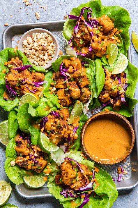 Crispy Peanut Butter Tofu Lettuce Wraps Asian Lentil Lettuce Wraps, Crispy Tofu With Peanut Sauce, Tempeh Lettuce Wraps, Plant Based Lettuce Wraps, Peanut Sauce Tofu Bowl, Healthy Tofu Recipes Clean Eating, Butter Lettuce Recipes, Tofu Salads, Peanut Butter Tofu