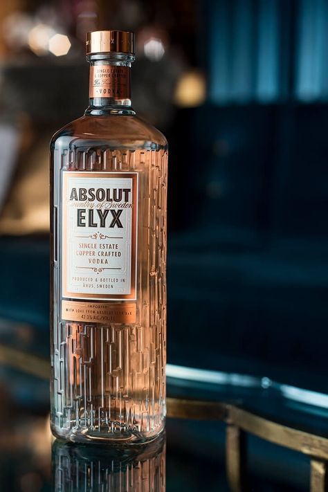 Made with single estate winter wheat and 100-year-old copper stills, Absolut Elyx is as artisanal as it gets. The result is a velvety smooth vodka that adds a silky touch to the classic Cosmo. Luxury Bottle Packaging Design, Liquor Bottle Design, Luxury Bottle Packaging, Tequila Branding, Packaging Texture, Product Retouching, Luxury Vodka, Polish Vodka, Vodka Bar