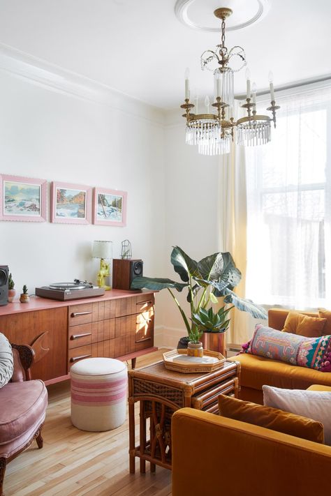 Pink Accents Living Room, Living Room Credenza, Vintage Brass Chandelier, Mid Century Credenza, Minimalist Flat, Vintage Stoves, Pink Sofa, Pink Living Room, Mid Century Living Room