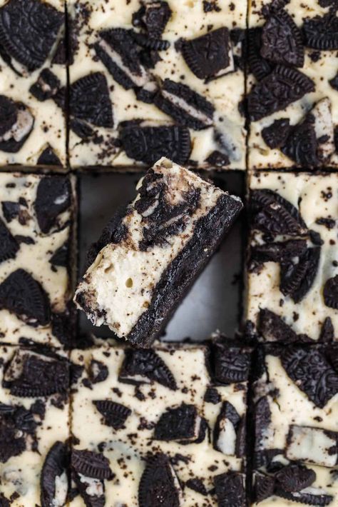 Oreo Cheesecake Bars combine the crunchy, classic flavor of Oreo cookies with a rich, creamy cheesecake filling! They're a hit for parties, special occasions, or just a cozy night in, and they're easy enough for even novice bakers to whip up with ease! Oreo Cheesecake Squares, Oreo Dessert Bars, Cream Cheese Oreo Cookies, Oreo Dream Bars, Cookies And Cream Cheesecake Bars, Oreo Cheesecake Cookies Recipe, Oreo Cream Cheese Dessert, Mini Cheesecakes No Bake, Mint Oreo Cheesecake