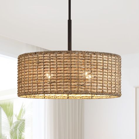 Coastal-inspired chandelier pendant light fixture, it features matte black hardware, and single tier drum shade which is meticulously hand woven of natural rattan, wicker and seagrass. Inside, a 4-light cluster in matte black casts generous light and creates interesting shadow patterns on the walls of your entry, dining room or bedroom. This collection can work with a variety of boho decors and even work in homes with coastal or farmhouse styling, which is an ideal selection for over your kitche Modern Farmhouse Dining Room Lighting, Farmhouse Chandelier Dining Rooms, Entry Dining Room, Black Coastal, Farmhouse Dining Room Lighting, Farmhouse Styling, Light Fixtures Farmhouse, Coastal Chandelier, Wicker Pendant Light