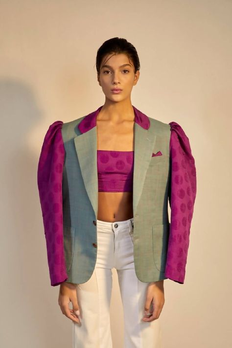 A dissolved blazer with a new lease of life! Upcycled & uplifted with manufacturing offcuts, the Frida is a perfect piece to add statement silhouette & pops of colour to your wardrobe. Please bear in mind that every upcycled piece is unique and will vary in colour tone, fabric, texture and sleeve details. Oversized fit Puff sleeves Side pockets Partly lined FabricMade from upcycled blazer and production offcuts. Care Do not wash Professional Dry Clean Only Do Not Bleach Do Not Tumble Dry Iron at Puff Sleeve Blazer, Refashion Jeans, Upcycle Clothes Diy, Fashion Silhouette, Elegant Dresses Classy, Futuristic Fashion, Upcycled Fashion, Upcycled Denim, Blazer Outfits