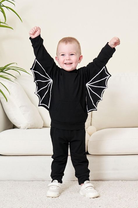 Black bat design, adorable boy and girl bat costumes, hoodie with pants, fashionable design to make your kid more appealing, black long sleeves, and long trousers. The Halloween costume play set is constructed of a medium-weight cotton mix that is both comfy and skin-friendly. #unisex #boys #girls #halloween #clothing_sets Bat Costumes, Halloween Outfits For Kids, Outfit For Halloween, Black Halloween Costumes, Bat Costume, Toddler Baby Boy, Bat Design, Kids Costumes Boys, Halloween Clothing