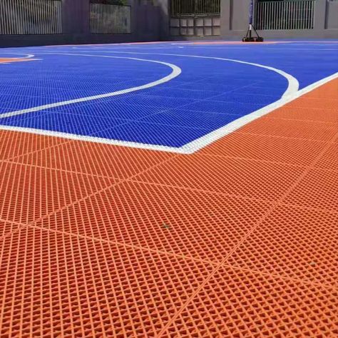 High quality non-slip suspended outdoor interlocking plastic basketball playground floor tiles. Give your community or team a court that lets kids run free and athletes play hard. For decades, we’ve been building a place to play for teams and communities across the globe. Our easy maintenance, safety features, and customizable designs surpass the expectations of coaches, athletes, builders, architects, and facility owners. Basketball Playground, Outdoor Sports Court, Sport Mat, Playground Flooring, Rubber Products, Play Garden, Rubber Tiles, Garden Floor, Sport Court