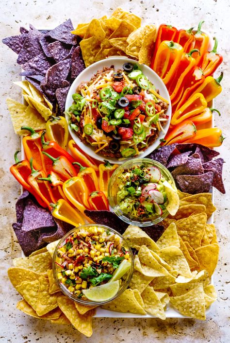 Summer Dip Board - Real Food by Dad Dip Board, Summer Dip, Layered Bean Dip, Mexican Corn Salad, Roasted Tomatillo, Mexican Corn, Charcuterie Inspiration, Fourth Of July Food, Bean Dip