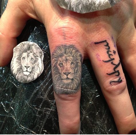 Lion Finger Tattoo, Men Finger Tattoos, Lion Tattoo On Finger, Ankle Tattoo Men, Marriage Tattoos, Geometric Wolf Tattoo, Animal Tattoos For Women, Lion Head Tattoos, Finger Tattoo Designs