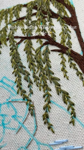 RiverBirchThreads on Instagram: "Today I’m working on the final embroidery for my upcoming book! 🙀✨📚 Here’s a peek at some behind the scenes work on some dreamy willow leaves 🍃 • • • • #embroidery #embroidered #embroiderylove #embroideryartist #embroideryinstaguild #embroideryvideo #dmc #dmcthreads #dmcembroidery #stitch #stitchfix #needlepainting #artstagram #tree #handstitched #artistsoninstagram #colour #fibreart #workinprogress #fibreshare" Willow Tree Cross Stitch, Embroidery On Leaves, Weeping Willow Tree Embroidery, Willow Tree Embroidery Pattern, Embroidered Oak Tree, Pine Tree Hand Embroidery, Cypress Tree Embroidery, Tree Bark Embroidery, Fir Tree Embroidery