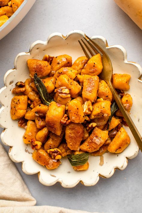 This Butternut Squash Gnocchi is made from scratch using simple ingredients, then tossed in a cozy sage butter sauce to make a delicious, restaurant-worthy meal. Vegan. Butternut Squash Gnocchi, Squash Gnocchi, Butternut Squash Sage, Sage Butter Sauce, Butternut Squash Puree, Fall Vegan Recipes, Sage Butter, Homemade Gnocchi, Grated Potato