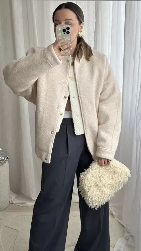 Have you heard, textured bags are a thing now? 🐥 Fluffy bag Anthropologie | Cream tonal layering outfit | Spring outfits | Boxer short trousers | Boucle cardigan | Oversized bomber jacket   #LTKover40 #LTKU #LTKworkwear Beige Fluffy Jacket Outfit, Boxer Trousers Outfit, White Teddy Jacket Outfit, Fluffy Bag Outfit, Luxury Bags Aesthetic, Cream Jacket Outfit, Boucle Jacket Outfit, Layered Outfits Spring, Teddy Jacket Outfit