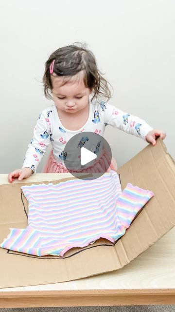 @oliviaandzoeplays on Instagram: "DIY Folding Board!⁣ ⁣ Toddlers love to imitate the adults around them - at least thats my experience with my kids.  They are always so keen to participate in our activities and day to day chores.⁣ ⁣ ✨Folding clothes is a great way to involve young kids in our home and teach them the importance of personal care and help build their confidence. ⁣ ⁣ To make it easier for Zoe, I made a folding board from cardboard and traced the outline of her t-shirt with a black marker.  After a quick demonstration, I invited her to try and she was able to fold about half a dozen t-shirts on her own with minimal help.⁣ We’ve been practicing folding the last couple of days and I love seeing her sense of pride as she completes the  task!⁣ ⁣ 👉Will your toddler like this challe Shirt Folding Board Diy, Clothes Folding Board, Shirt Folding Board, Independent Toddler, Folding Board, Montessori Activity, Practical Life Activities, Shirt Folding, Board For Kids